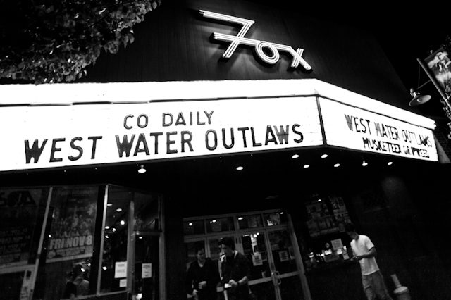 Theater marquee displaying West Water Outlaws.