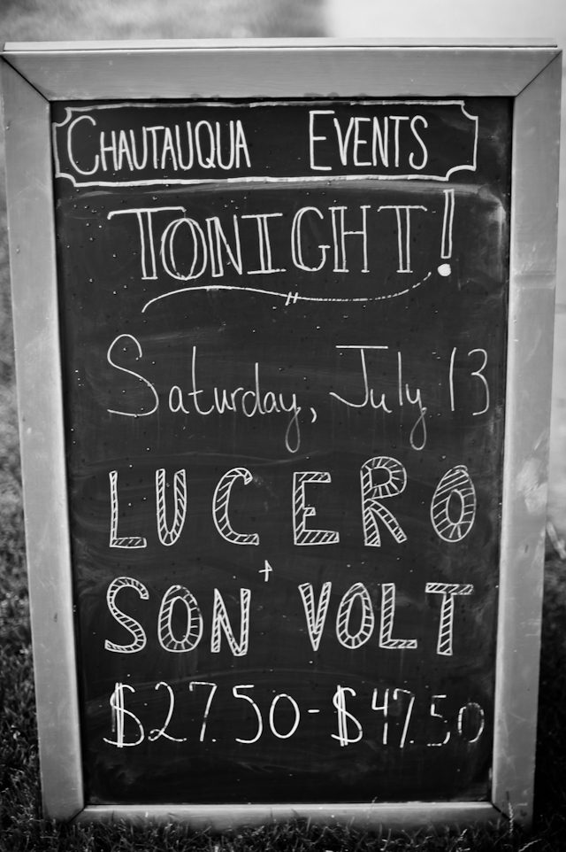 Chalkboard advertising concert event and ticket prices.