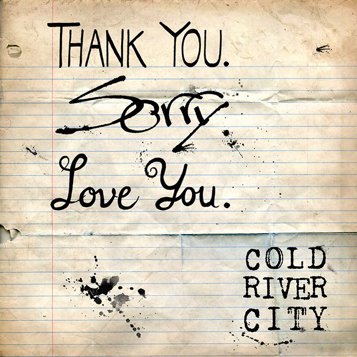 Handwritten notes with splatters on paper.