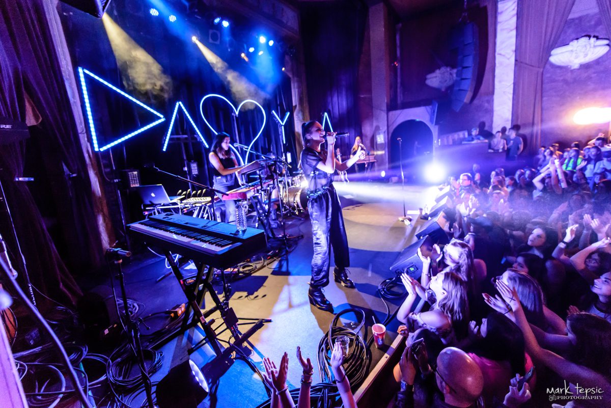 Live concert with vibrant stage lighting.