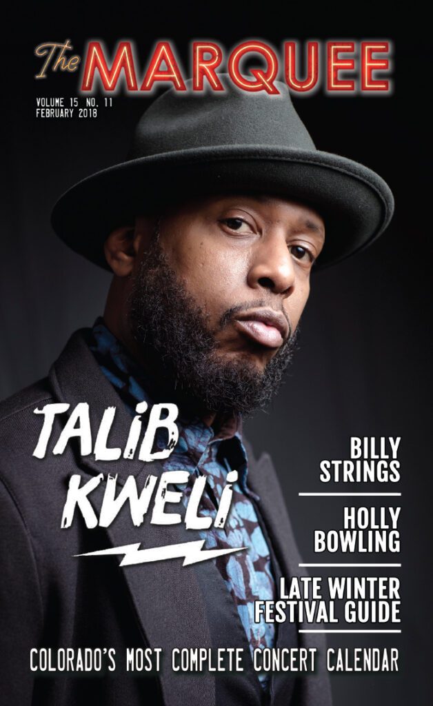 Magazine cover featuring a man in hat.