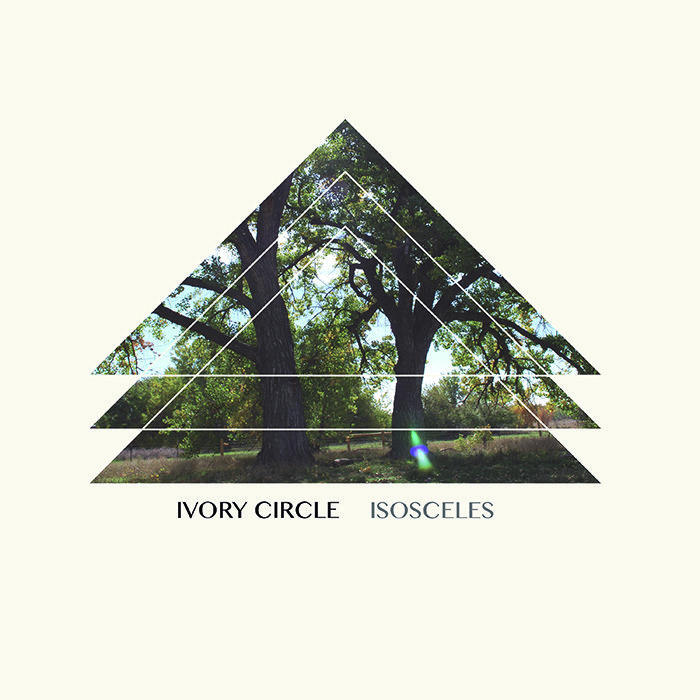 Triangle with trees and band name.