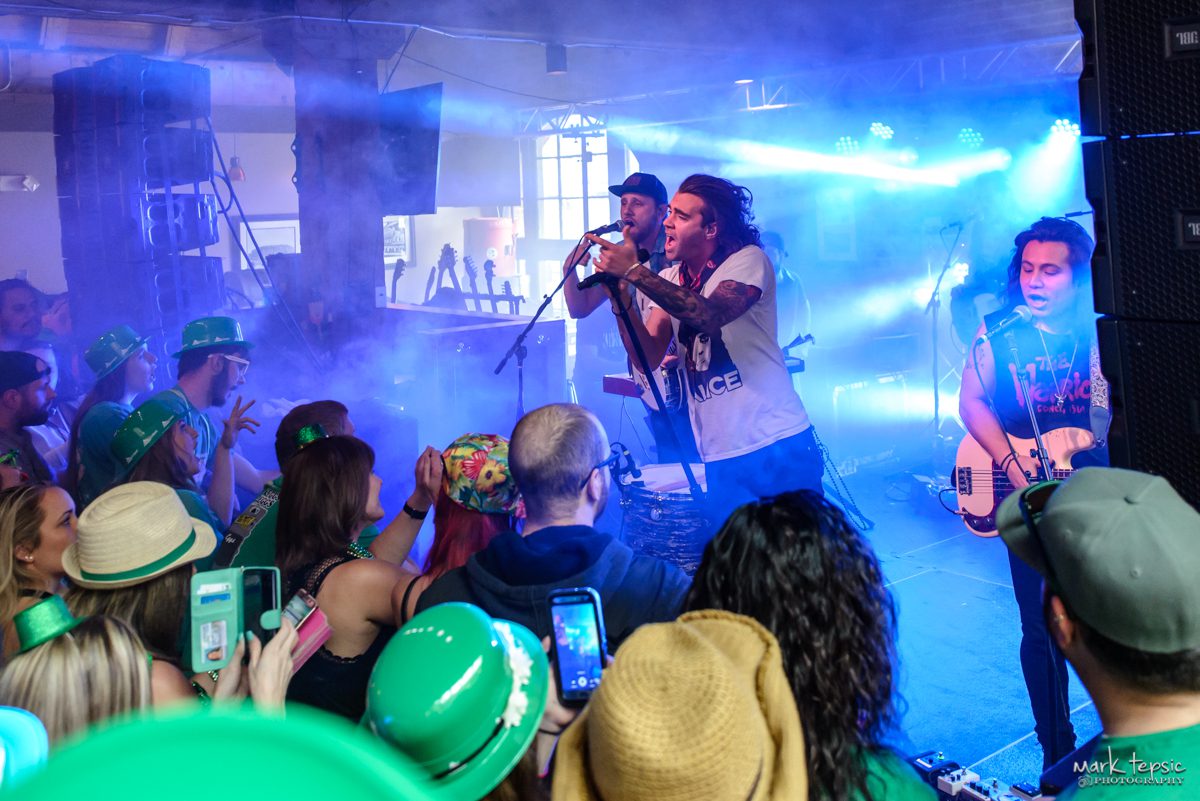 Band performing live at a festive event.