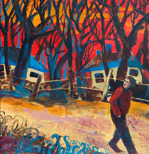 Man walking near trees and colorful sunset.