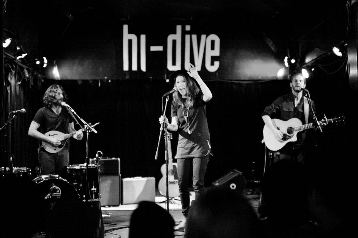Band performing live at hi-dive venue.
