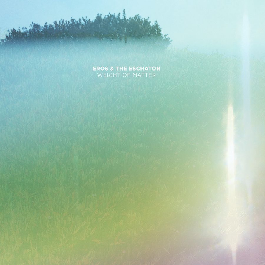 Album cover with misty field and text.