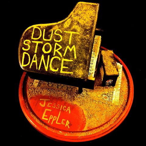 Dusty piano art with text and name.