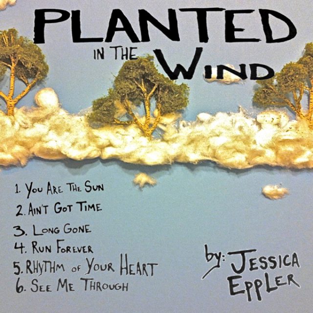 Album cover with trees and cloud art.