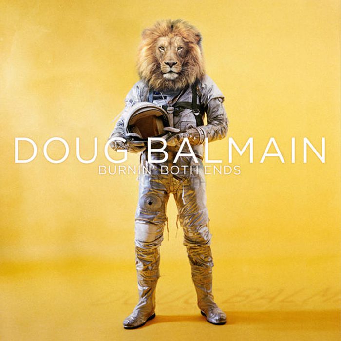 Lion in spacesuit on yellow background.
