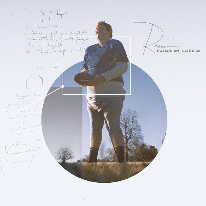 Person standing in front of abstract background.