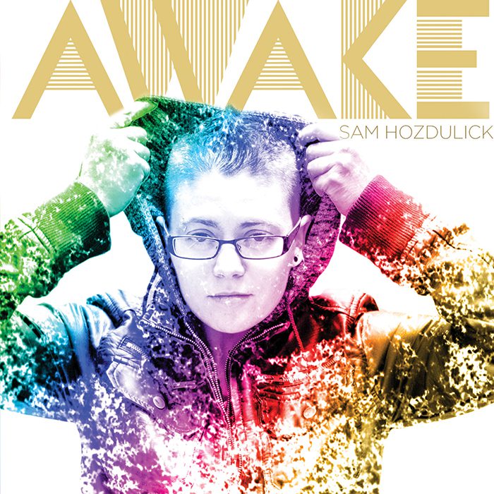 Colorful album cover with person in jacket.