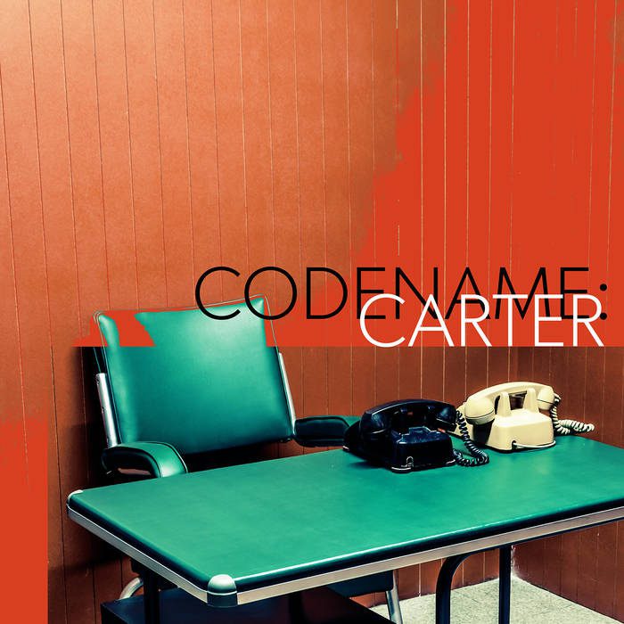 Retro office with phones, "Codename Carter" text.