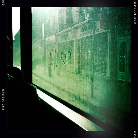 Heart drawn on a foggy window.