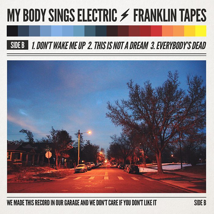 Album cover with street at dusk scene.