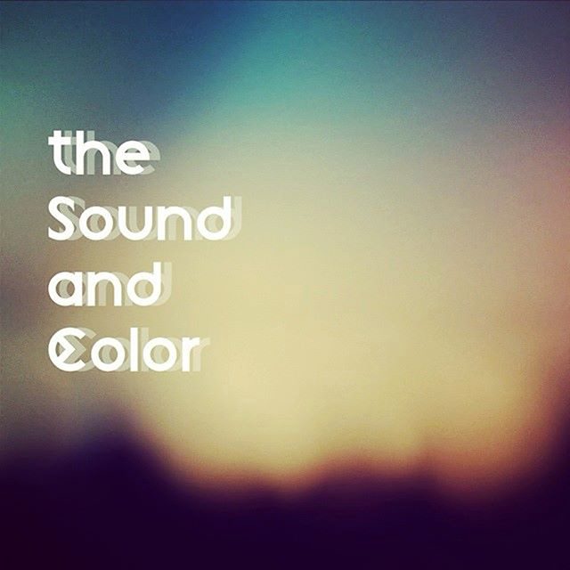 Blurry background with text "Sound and Color".
