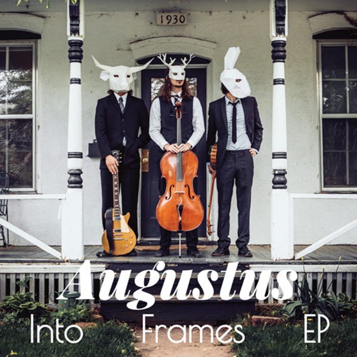 Three musicians in animal masks with instruments.