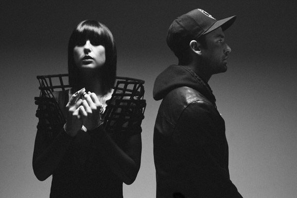 Two people in dramatic black and white.