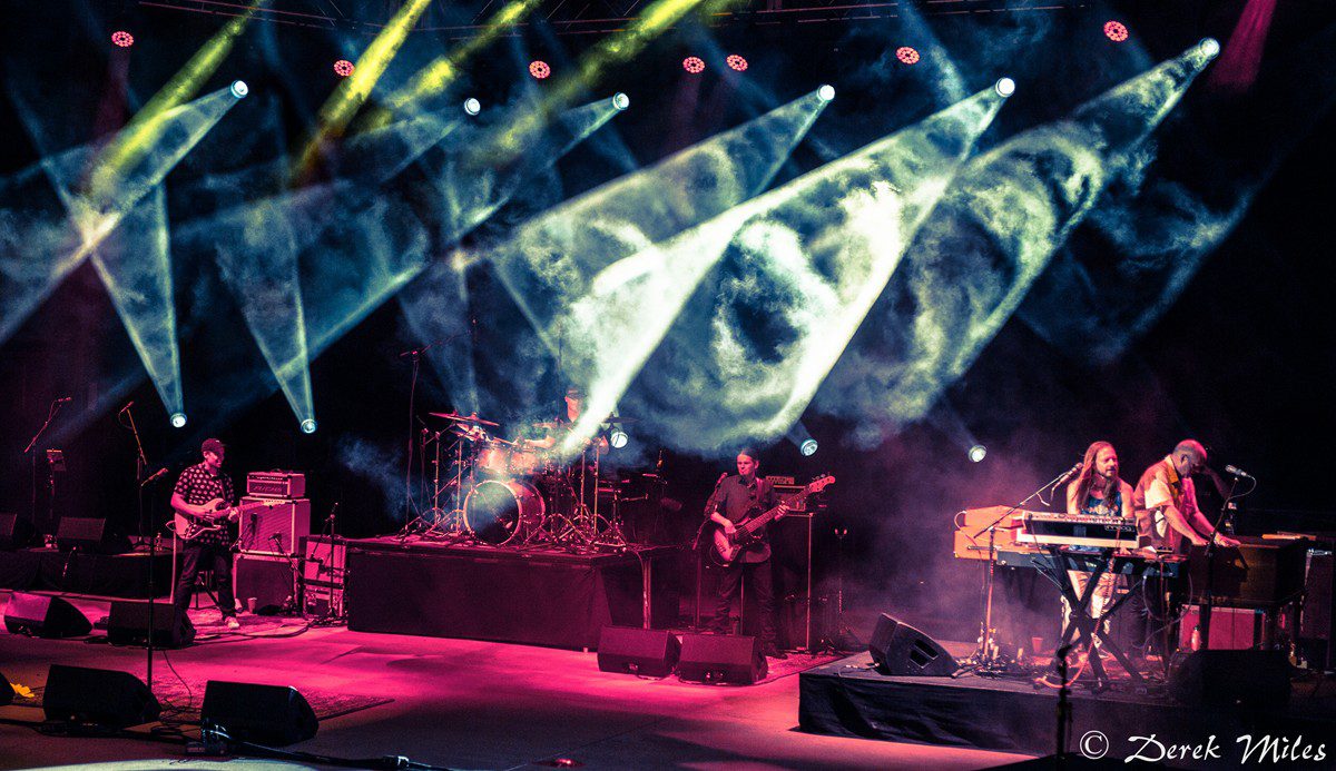 Concert stage with colorful lighting effects.