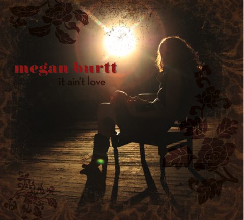 Silhouette of woman sitting in sunlight.
