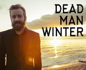 Man standing by sunset, "Dead Man Winter".