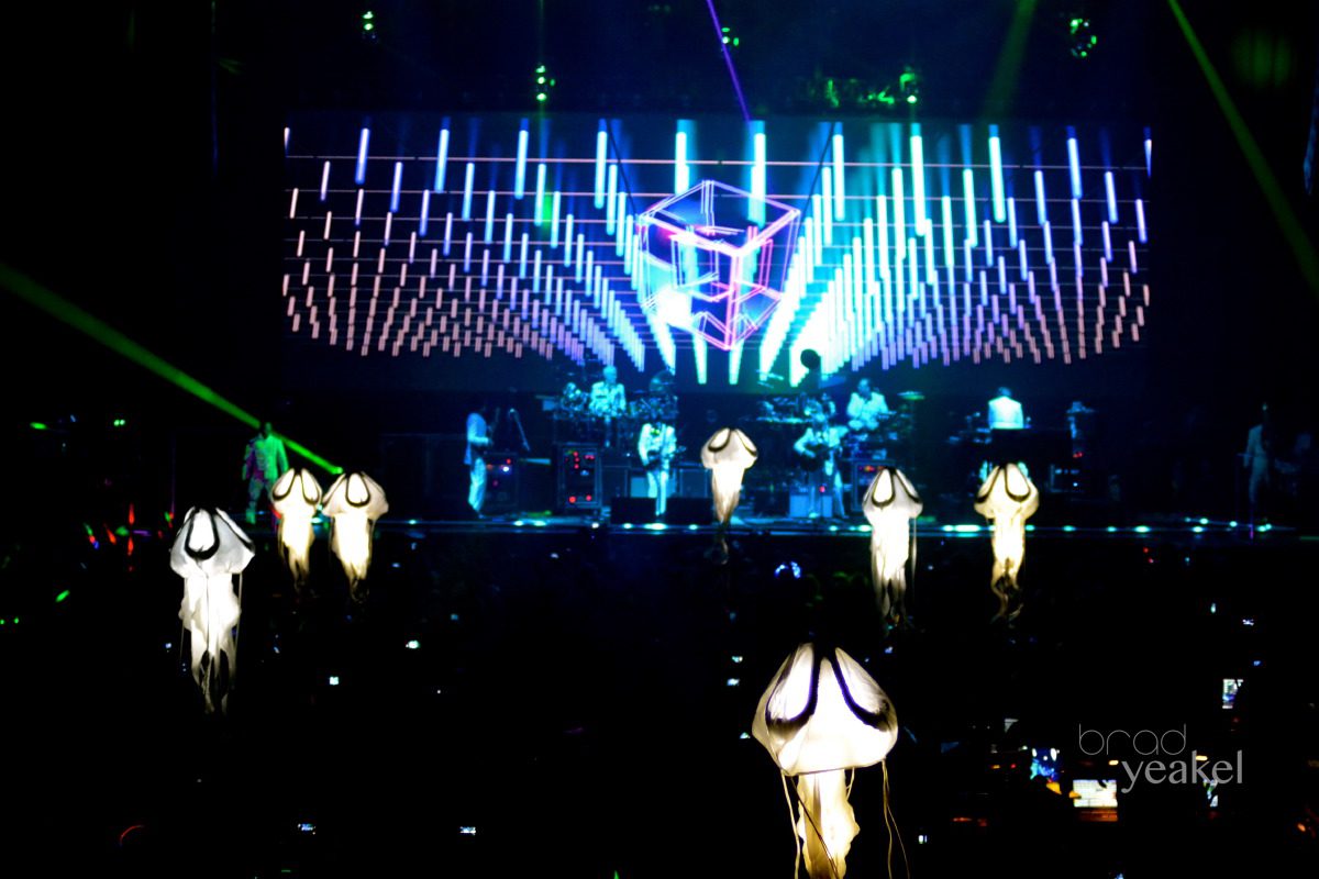 Concert with vibrant stage lights and decorations.