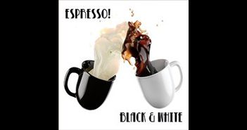 Two mugs with coffee and cream splashing.