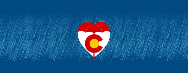 Heart-shaped umbrella with Colorado flag design.
