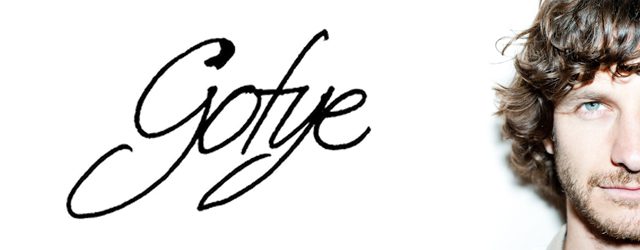 Gotye logo with partial face visible.