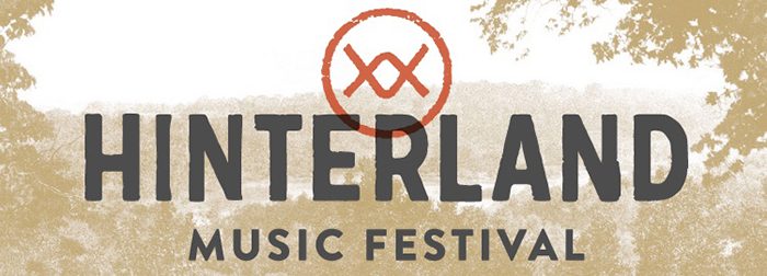 Hinterland Music Festival logo with trees.