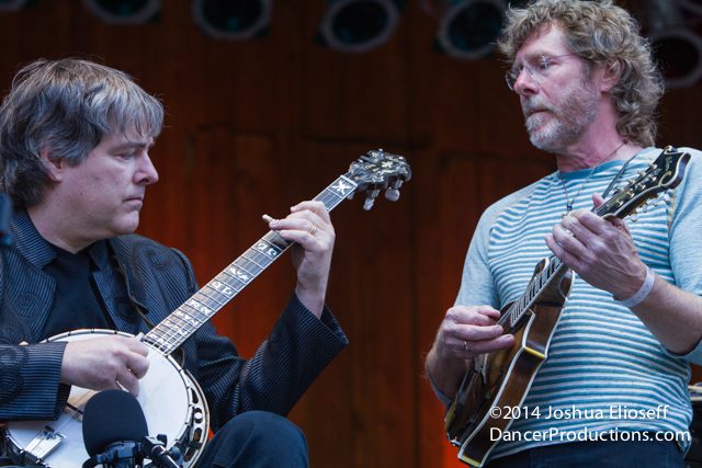 Two musicians playing banjo and mandolin.