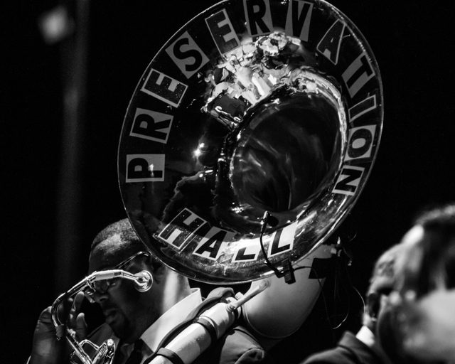 Musician playing sousaphone with "Preservation Hall.