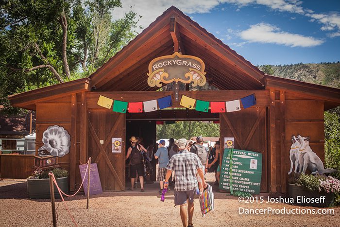 Entrance to RockyGrass festival with visitors entering.