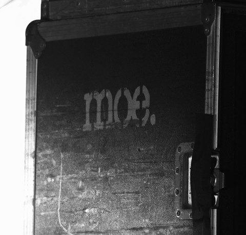 Black equipment case with "moe." logo.
