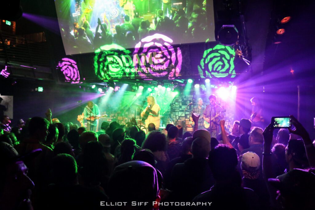 Live band performing at a vibrant concert.