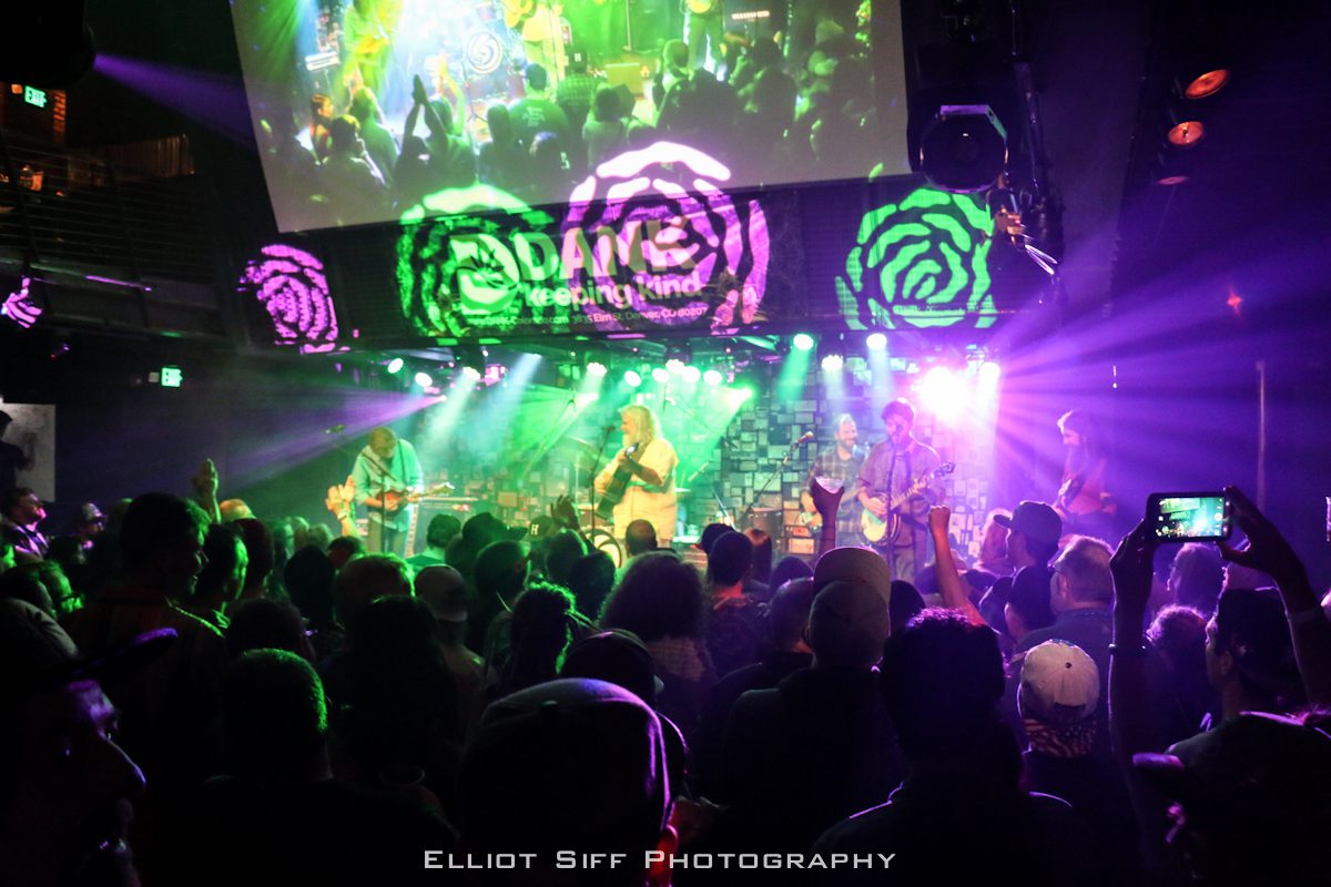 Live band performing at a vibrant concert.