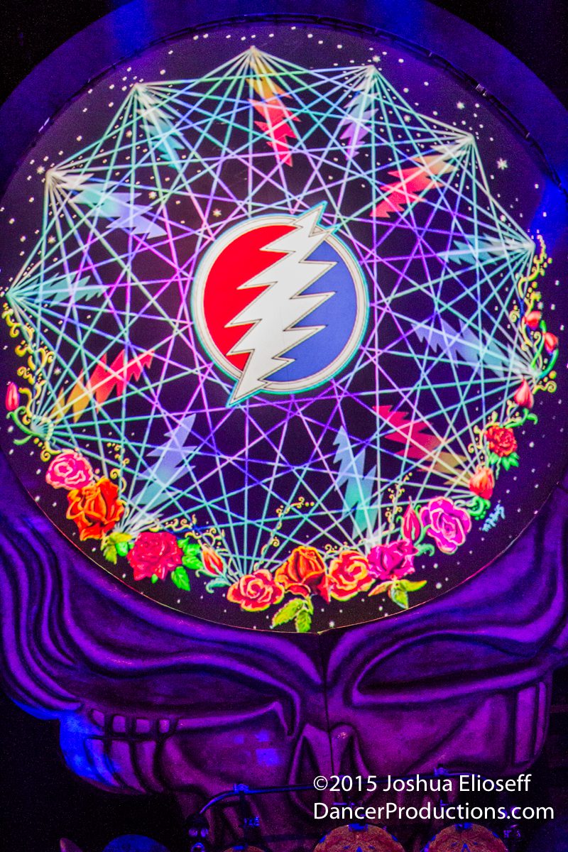 Psychedelic artwork with geometric patterns and roses.