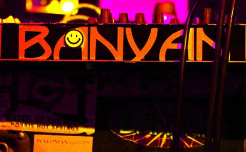 Colorful "BANYAN" text with a smiley face.