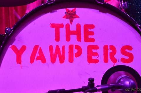 Drum with "The Yawpers" in red text.