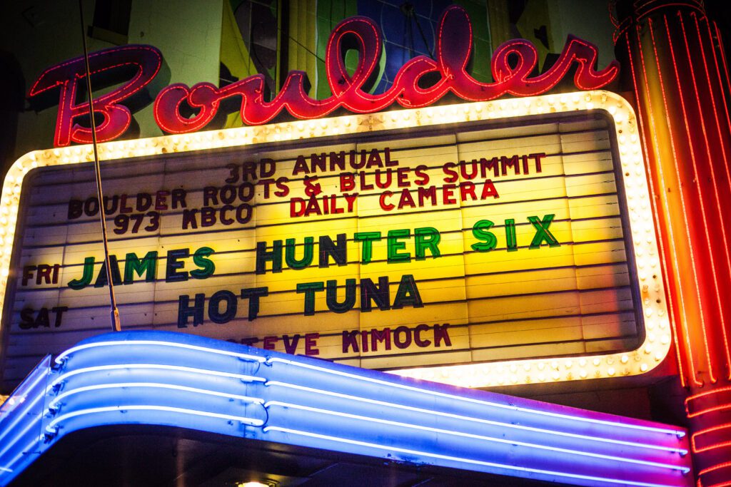 Neon sign for Boulder music event venue.