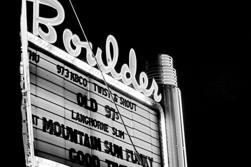 Vintage theater marquee with neon lights.