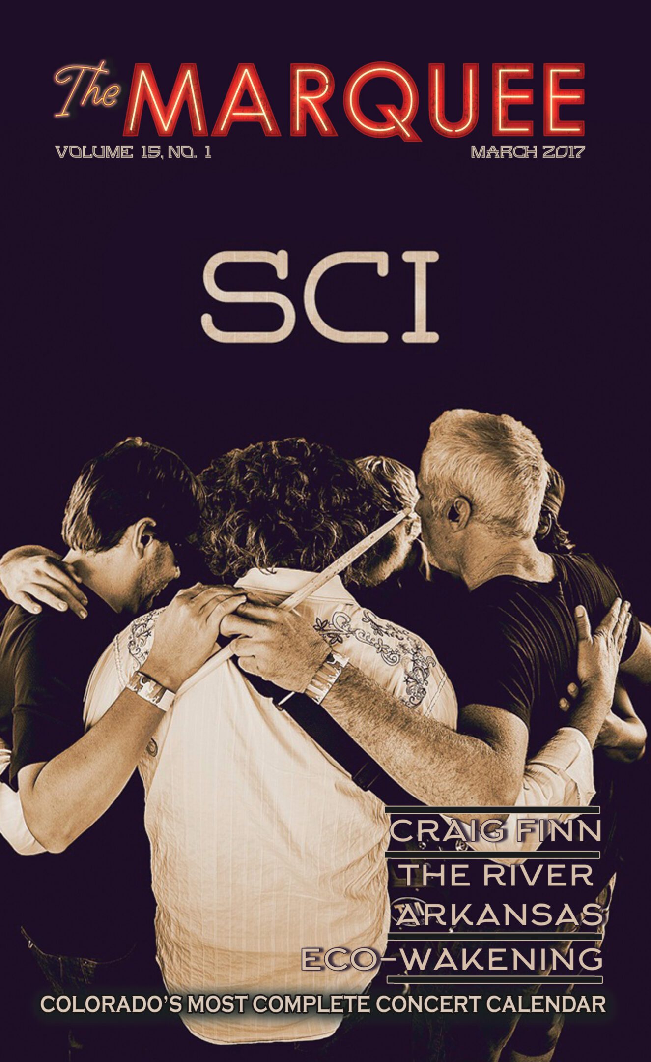 Band members embracing on magazine cover.