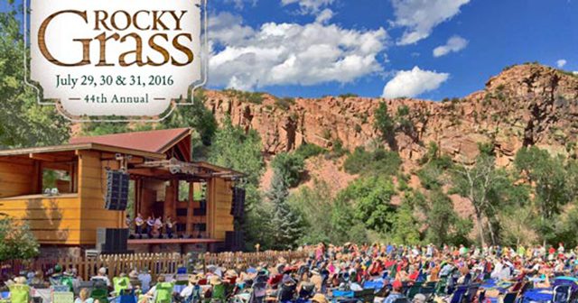 Outdoor music festival with audience and stage.