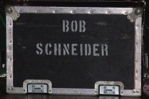 Black equipment case with "Bob Schneider" text.