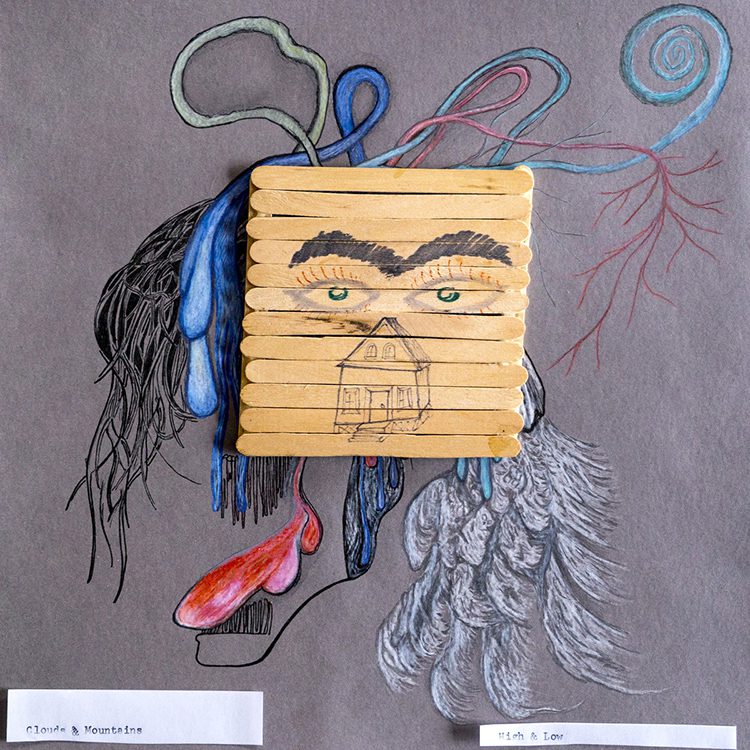 Abstract face with popsicle stick mask.