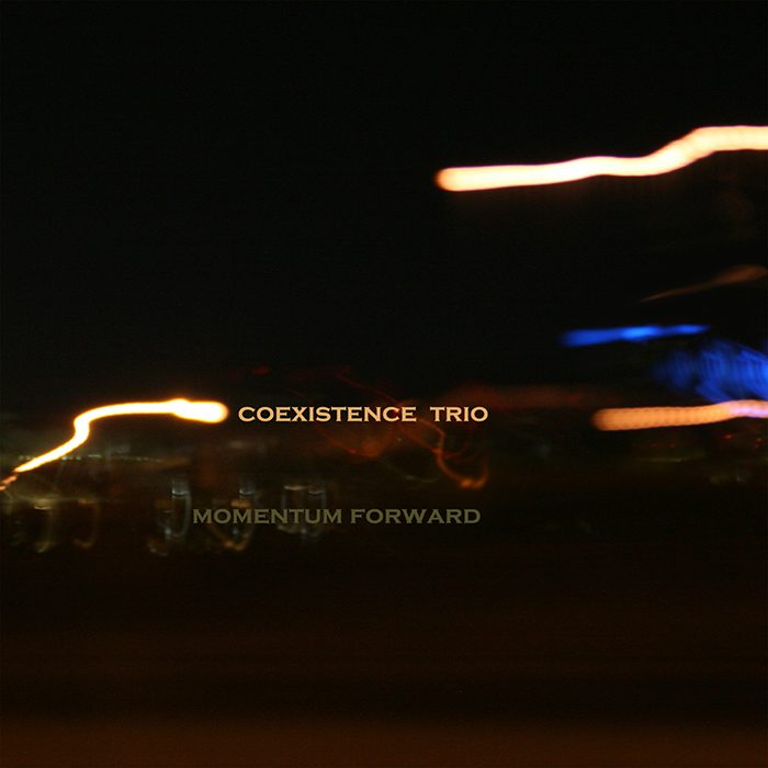 Blurry lights with "Coexistence Trio" text.