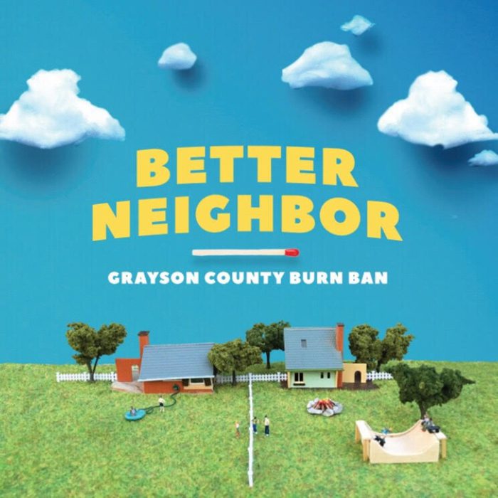 Miniature houses under blue sky, "Better Neighbor".