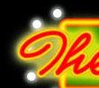 Colorful neon sign with cursive text.