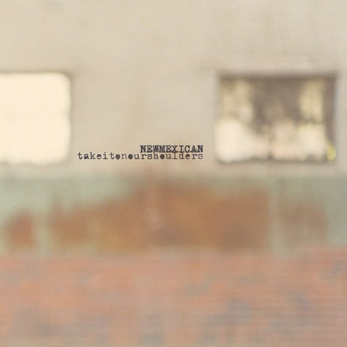 Blurry wall with text in center.