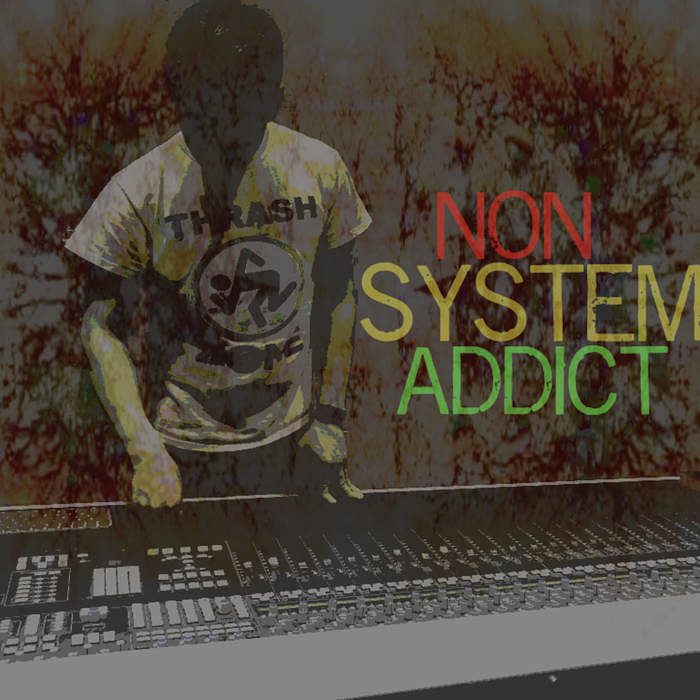 Person at mixing console, "Non System Addict".