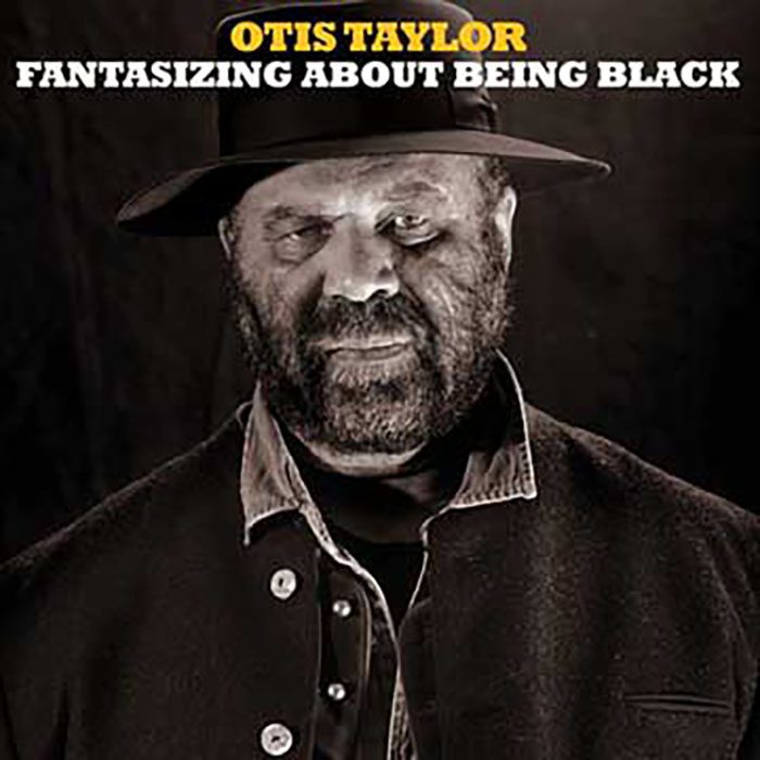 Man in hat on album cover.